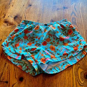 Maaji teal floral shorts size M. Lined with drawstring. Extremely high quality.